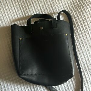 Portland leather mini crossbody in black